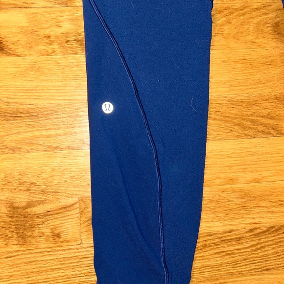Lululemon navy leggings w/ laser cut design down sides - Picture 4 of 10